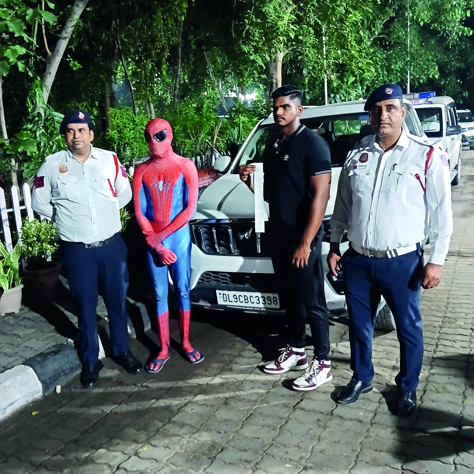 ‘Spiderman’ spotted riding on car’s bonnet, cops take action