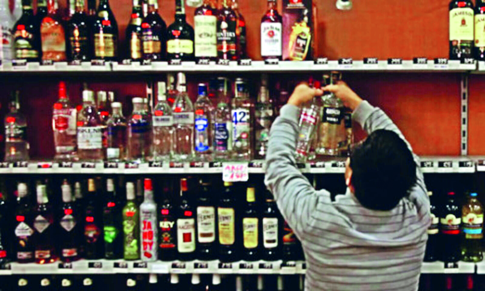 Liquor to be sold at old   prices during Puja this year