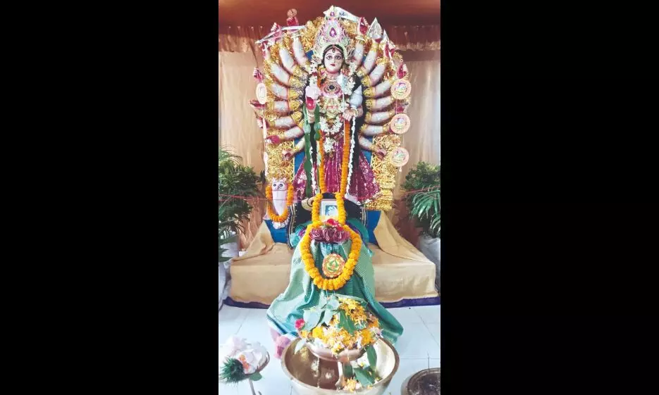 People offer puja to 18-handed Goddess on Lakshmi Puja eve