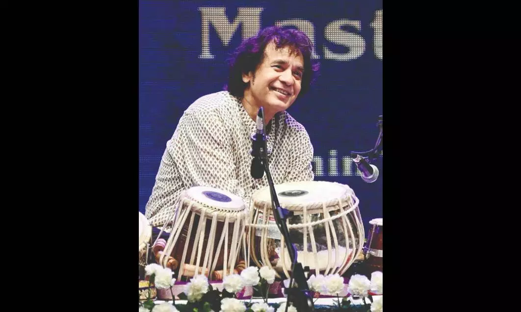 The hands that made tabla sing go still