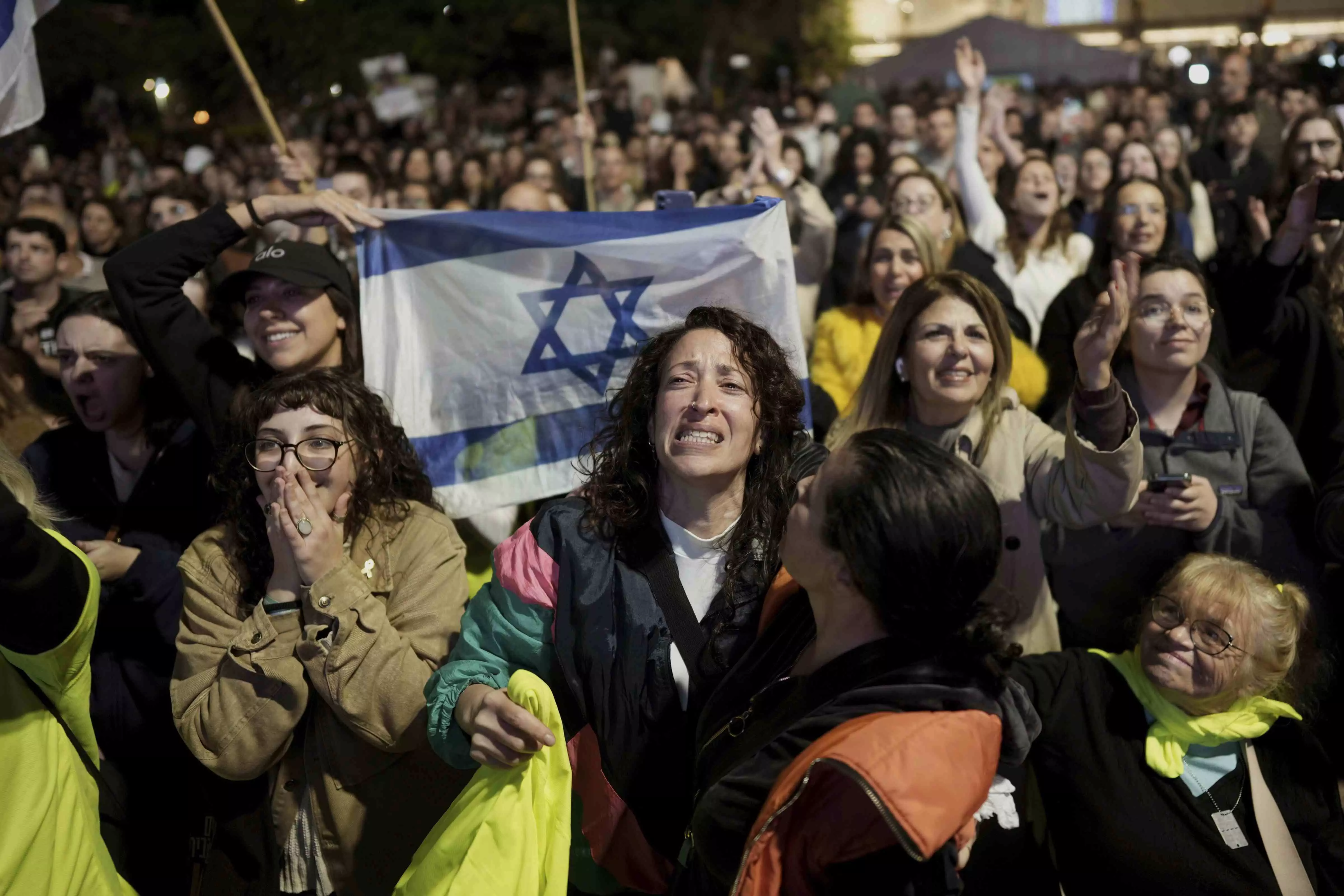 Three Israeli hostages arrive in Israel as fragile ceasefire passes first hurdle