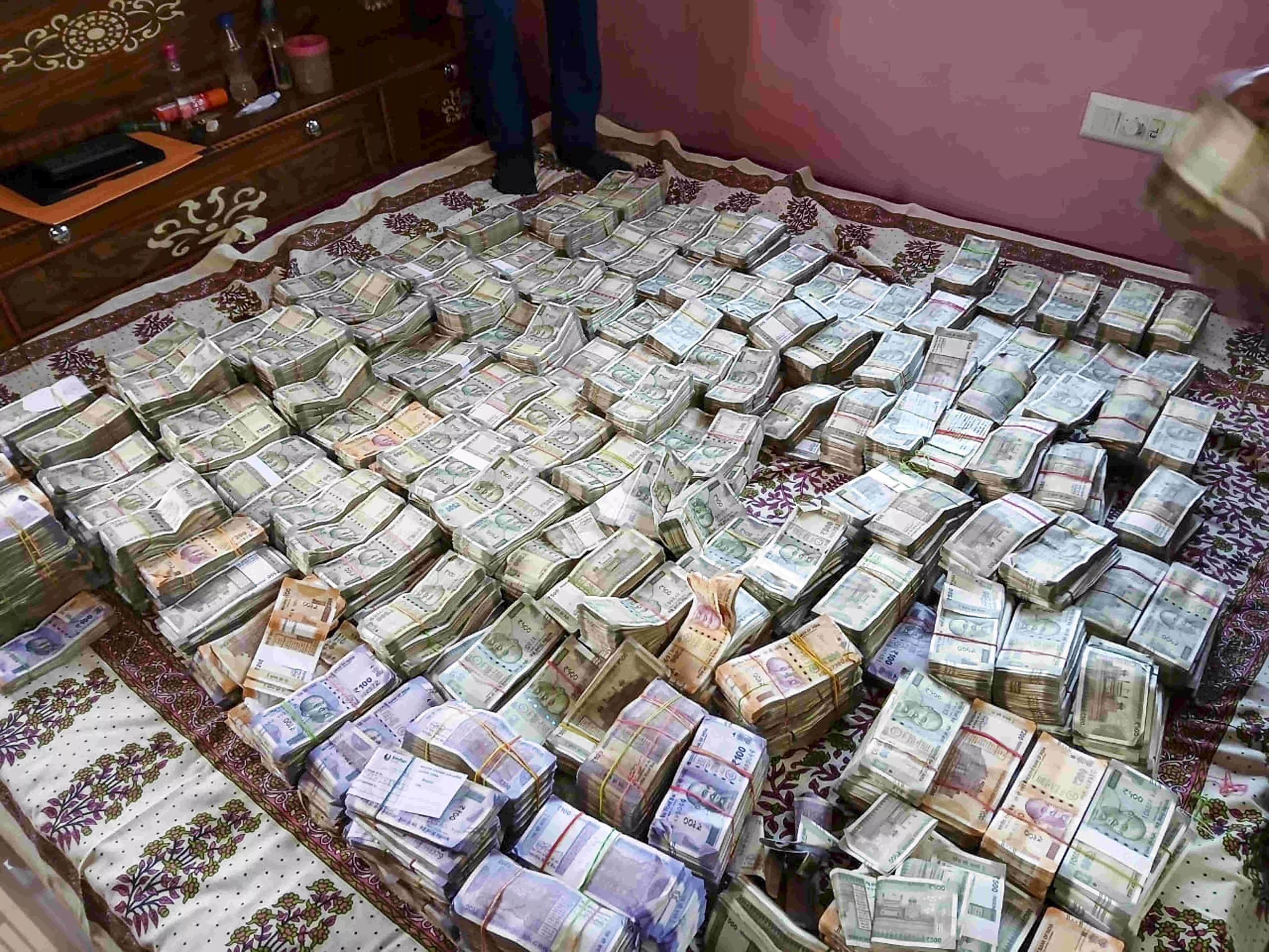 SIT freezes Rs 47.96 crore, seizes 1.83 crore cash in govt funds embezzlement case