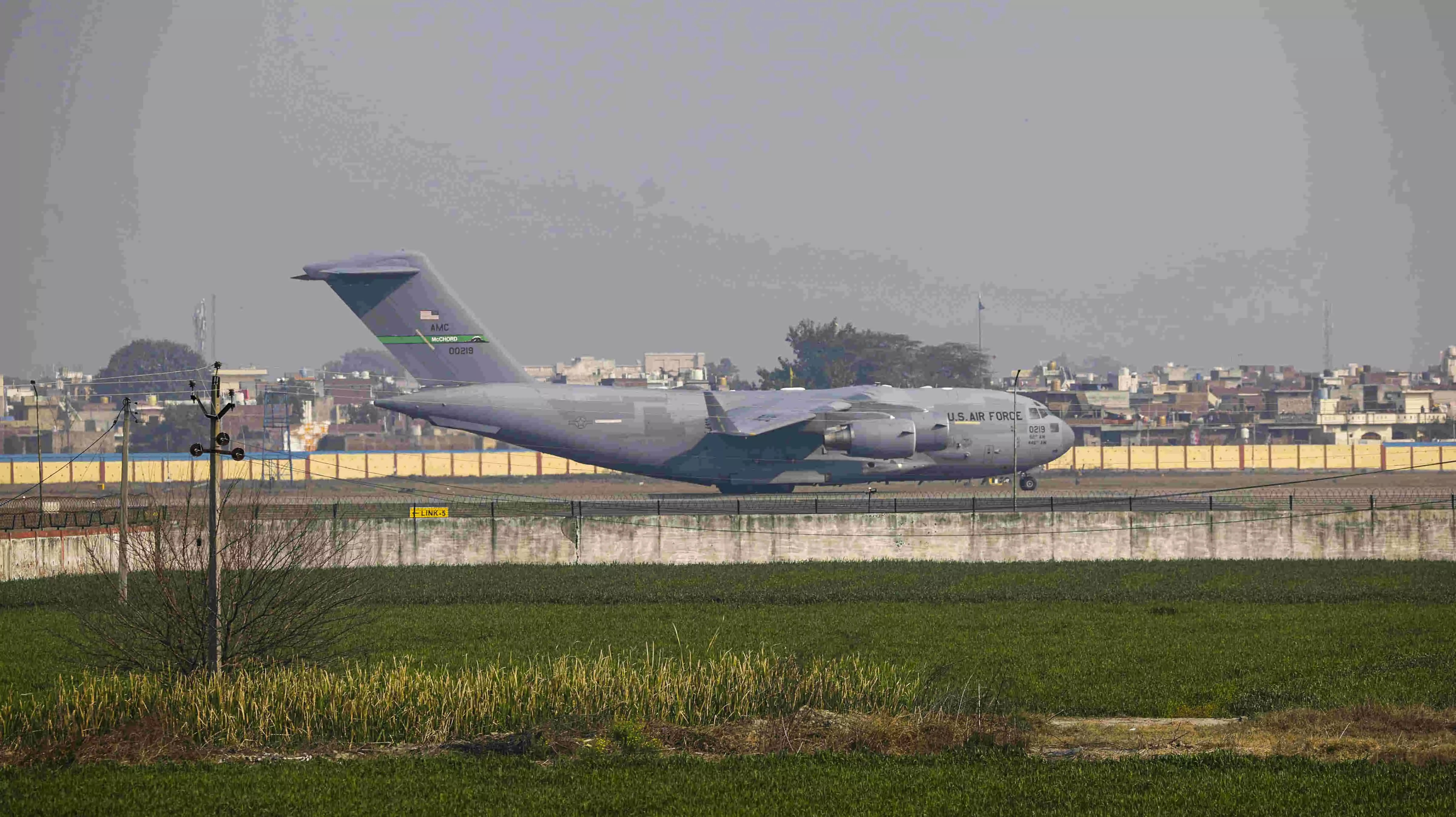 US C-17 military plane carrying 104 deported Indian migrants lands in Amritsar