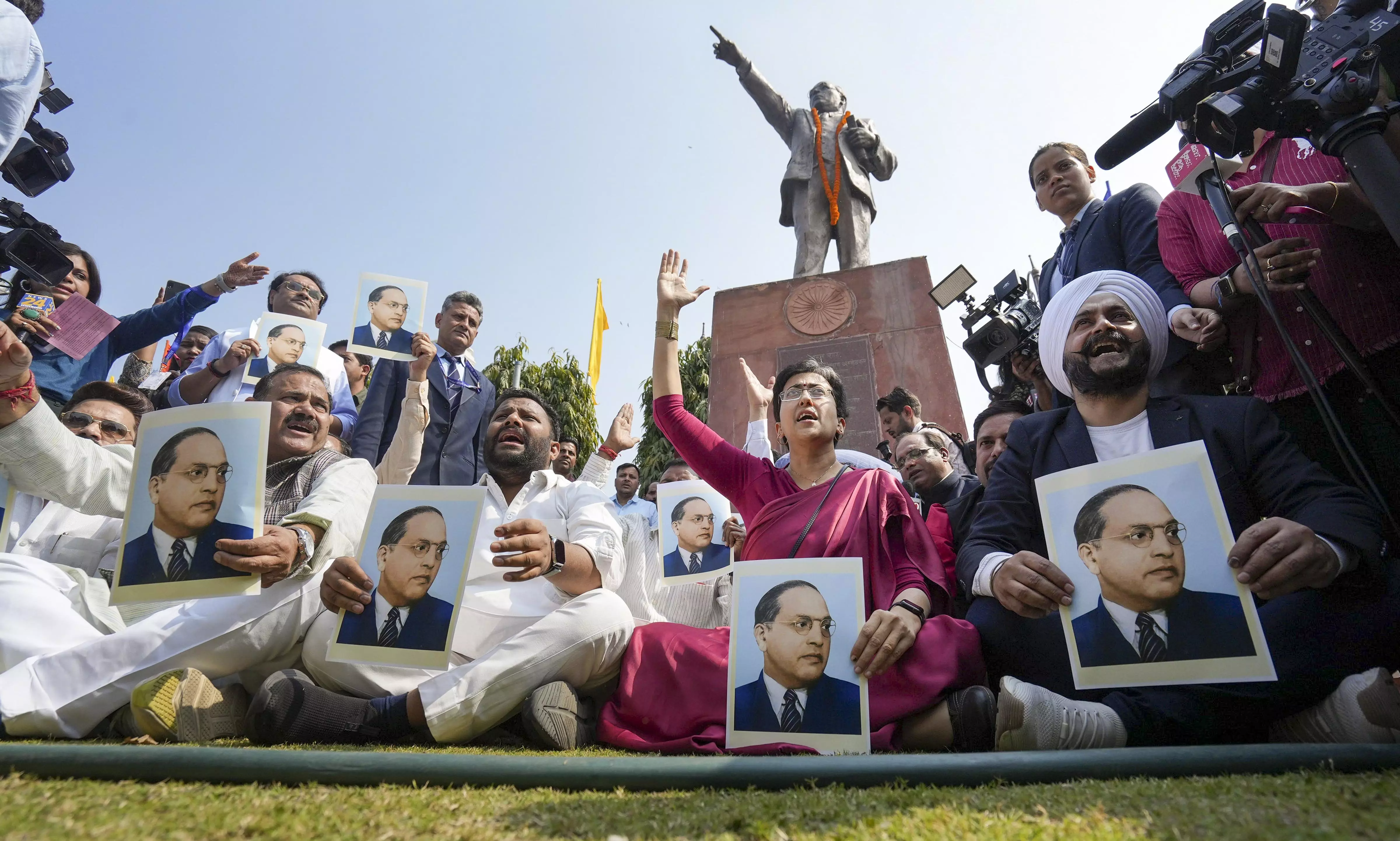 Does BJP think Modi is greater than Ambedkar? Atishi questions amid portrait row