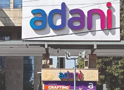 NCLAT issues notice to Adani’s Ambuja Cements over plea filed by a former promoter of Sanghi Industries