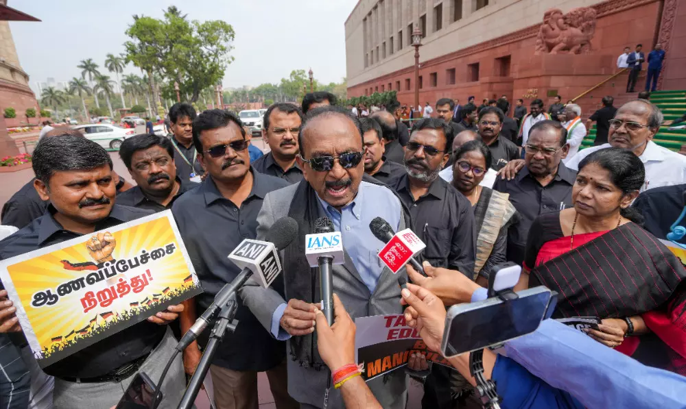 DMK MPs stage protest in Parliament complex against NEP, demand apology from Pradhan